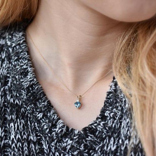 Goldanhänger mit Topas und Diamanten Dorevie