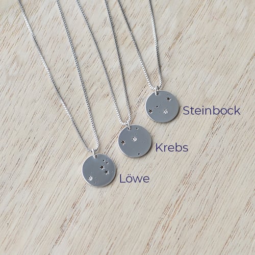 Silberner Anhänger mit Sternbild und Diamant Nyala