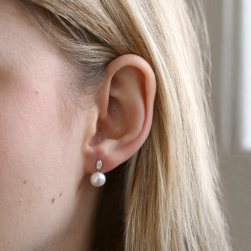 Perlenohrringe aus Gold und mit Diamanten Holis
