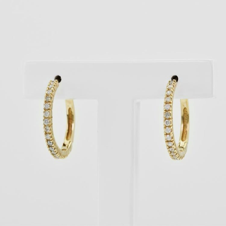 Goldene Ohrringe mit Diamanten 2724