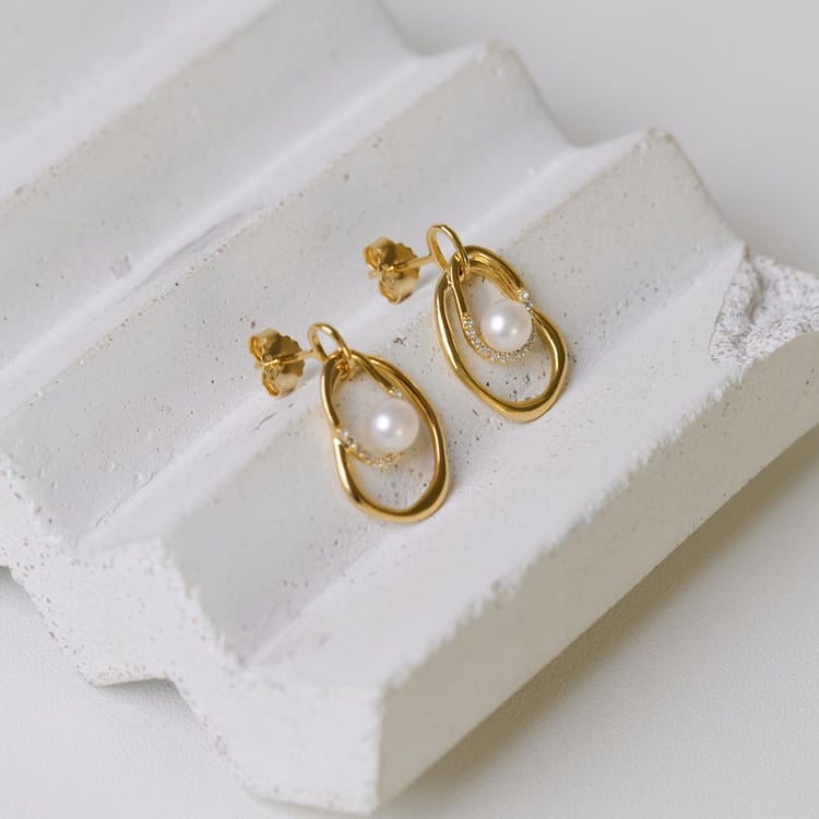 Silberne Perlenohrringe mit weißen Topasen 164014