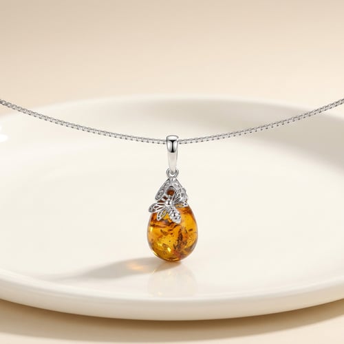 Bernsteinanhänger aus Silber mit Biene Honey