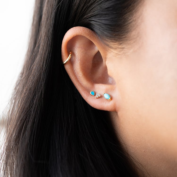 Goldener Piercingstecker mit Türkisen Wendy 126552