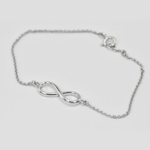 Schmuckset aus Gold mit Unendlichkeitszeichen Infinity