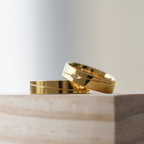 Flache Eheringe aus Gold mit Diamanten Tesar