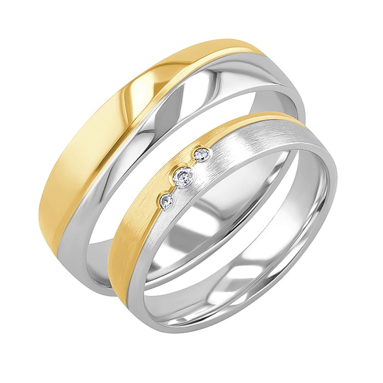 Eheringe aus Gold mit drei Diamanten Brennan