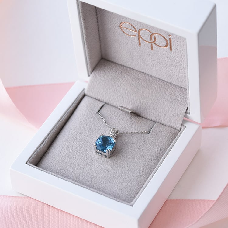 Goldener Anhänger mit blauem Topas 76103