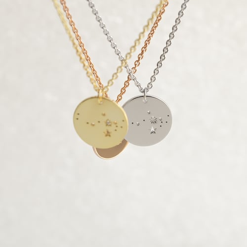 Goldener Anhänger mit Sternbild und Diamant Nyala