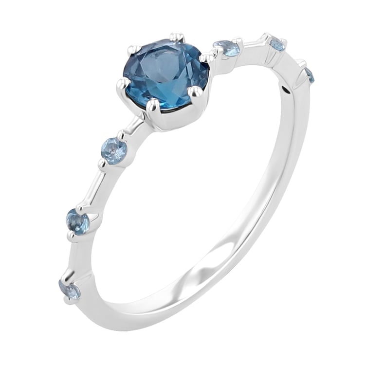 Ring mit Londoner Topasen und seitlichen Schweizer Topasen Imelda