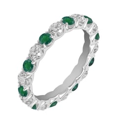 Goldener Ring rundum mit Smaragden und Diamanten Mette