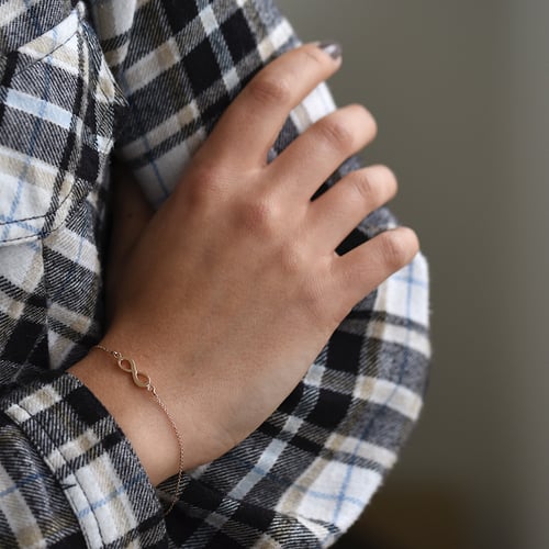 Schmuckset aus Gold mit Unendlichkeitszeichen Infinity