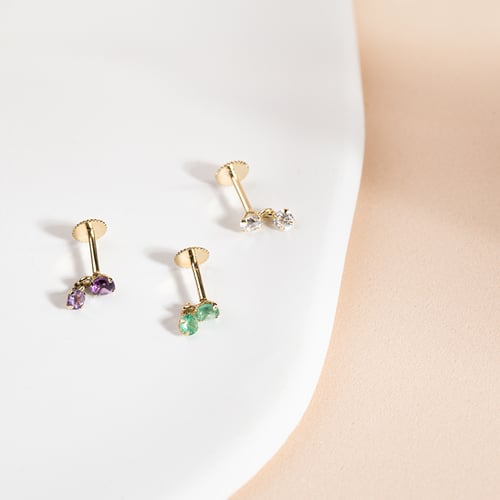 Goldener Piercingstecker mit Zirkonia Dyre