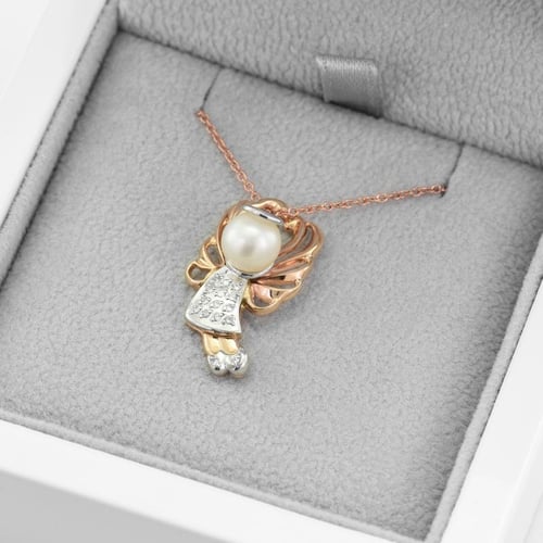 Engel mit Perle und Diamanten Angel