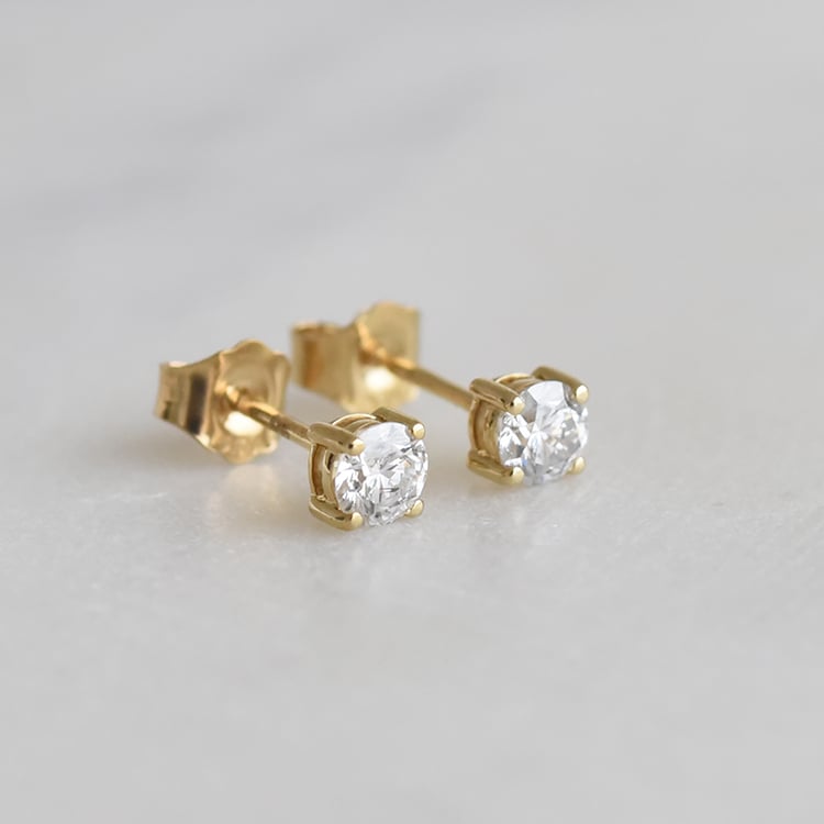 Ohrringe mit Diamanten und vier Krappen Christi 91951