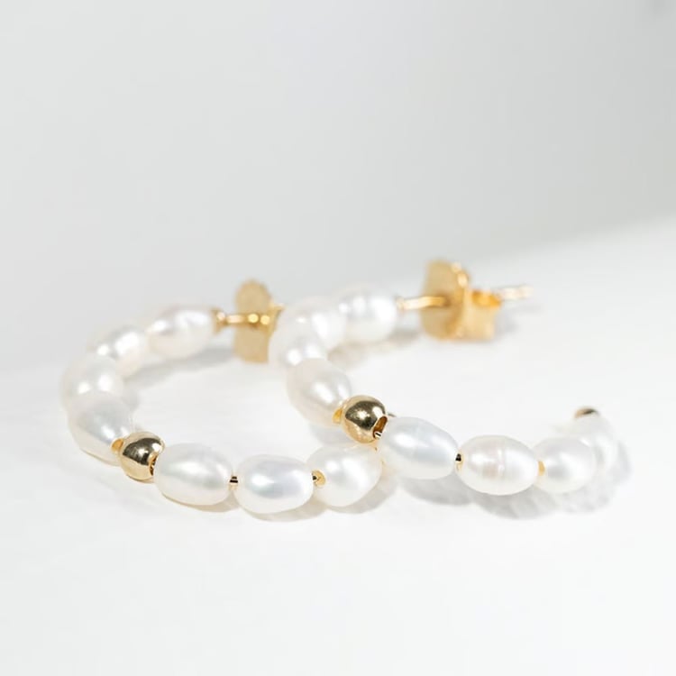 Silbernes Schmuckset mit Perlen 163816