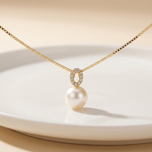 Eleganter goldener Anhänger mit Perle und Zirkonia Nana