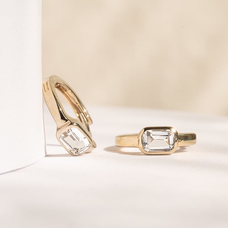 Silbernes Schmuckset mit weißen Topasen Toula 143057