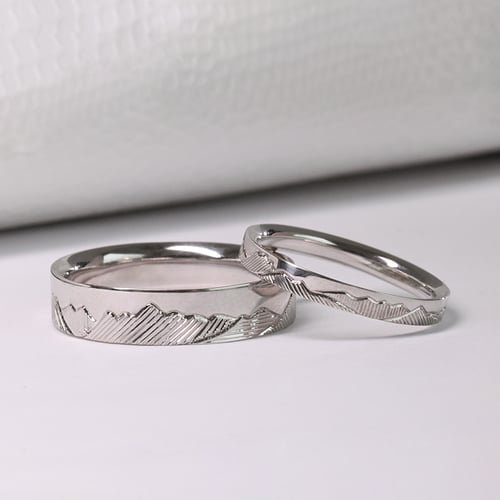 Eheringe aus Platin mit Bergpanorama von Hand graviert Safa