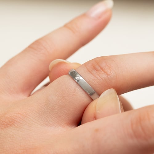 Trauringe aus Platin mit einem Diamanten Stanista