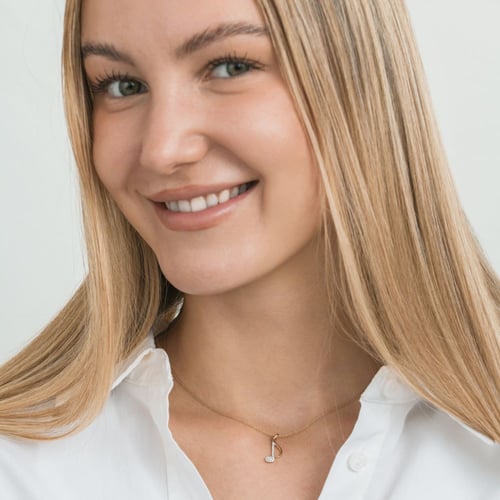 Anhänger aus Gold mit Diamanten in Form einer Note Bety