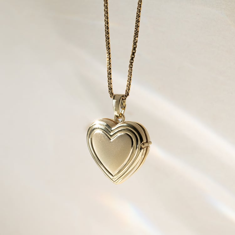 Silbernes Medaillion in Herzform zum Öffnen 140325