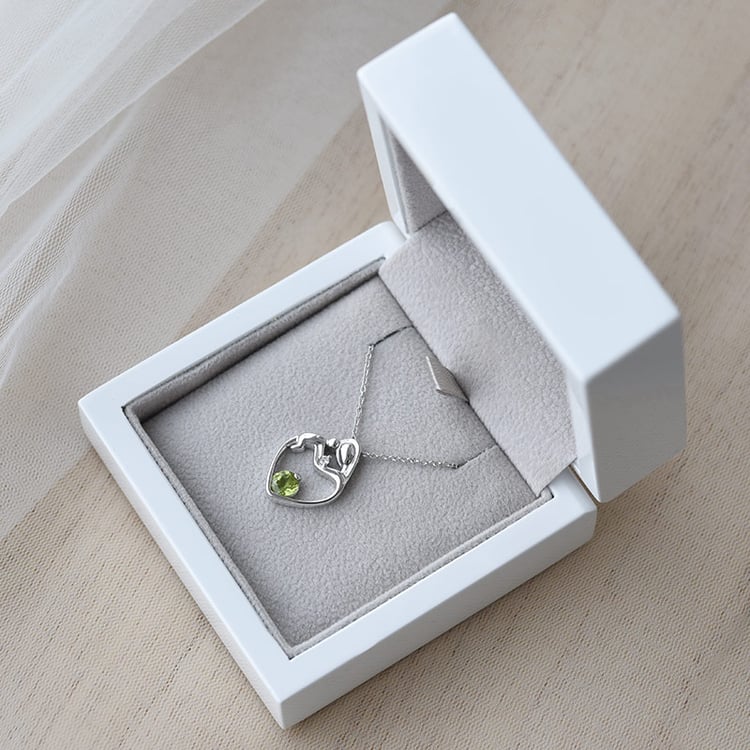 Mutter und Kind Goldanhänger mit Olivin und Diamanten 68847