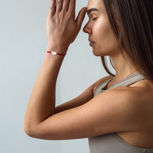 String Armband mit dem Symbol Hamsa