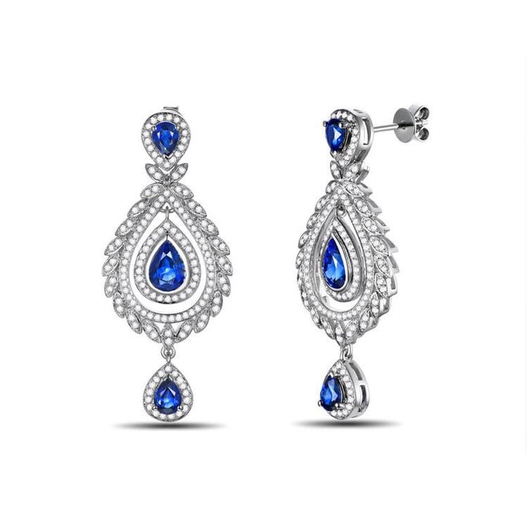 Goldene Ohrringe mit Saphiren 7678