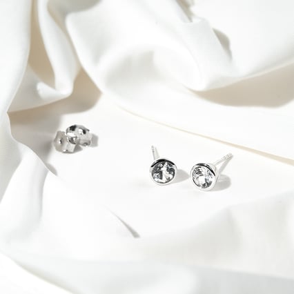 Ohrringe mit weißen Topasen Wetty