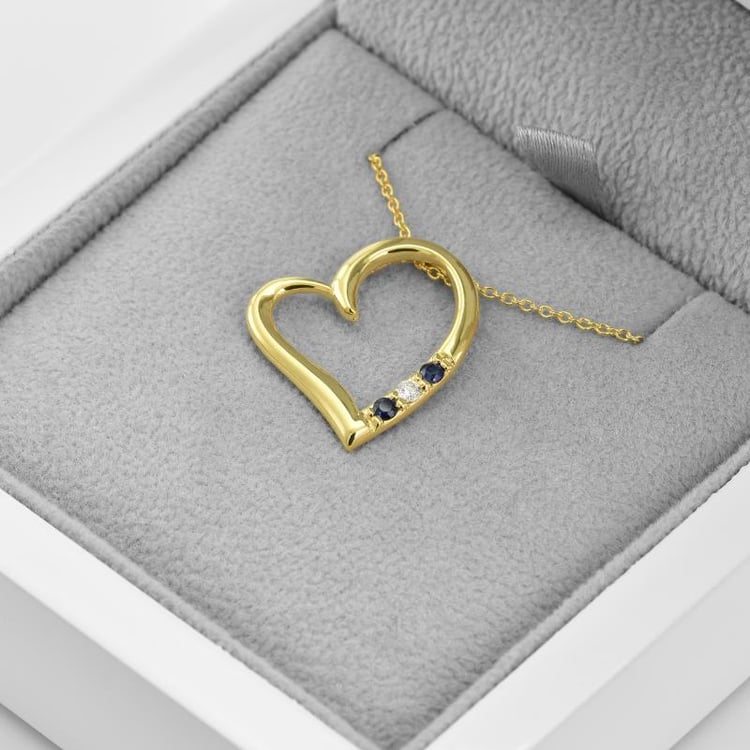 Goldener Anhänger Herzform mit Saphiren und Diamanten Tanish 37472