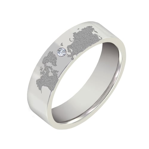 Goldene Trauringe mit Gravur der Weltkarte und Diamant Zeoni