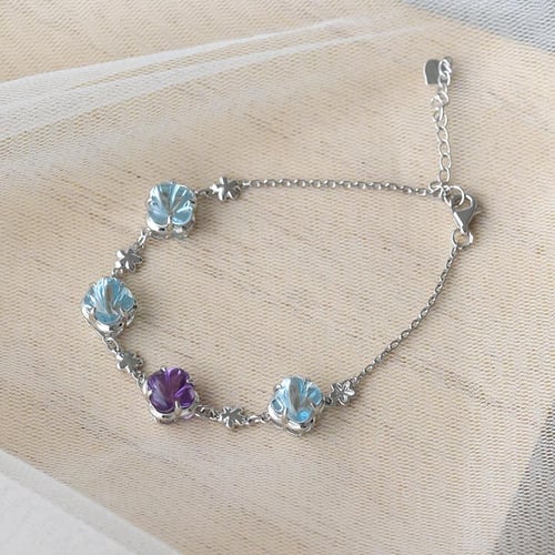 Goldenes Armband mit Topasen und Amethyst Heady