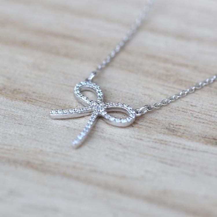 Goldene Schleife Anhänger mit Diamanten 51716