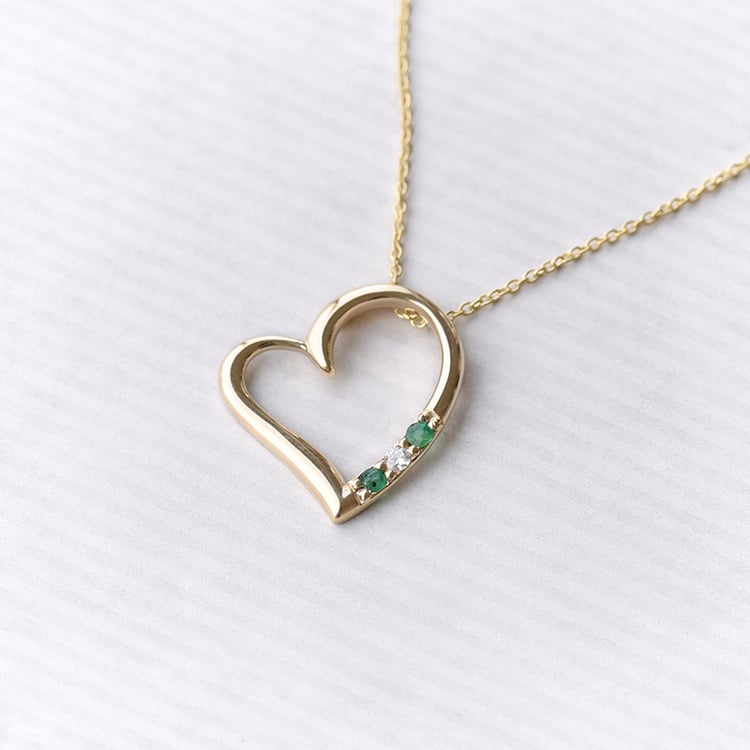 Anhänger in Herz-Form aus Gold mit Smaragden und Diamant Tanish 74340