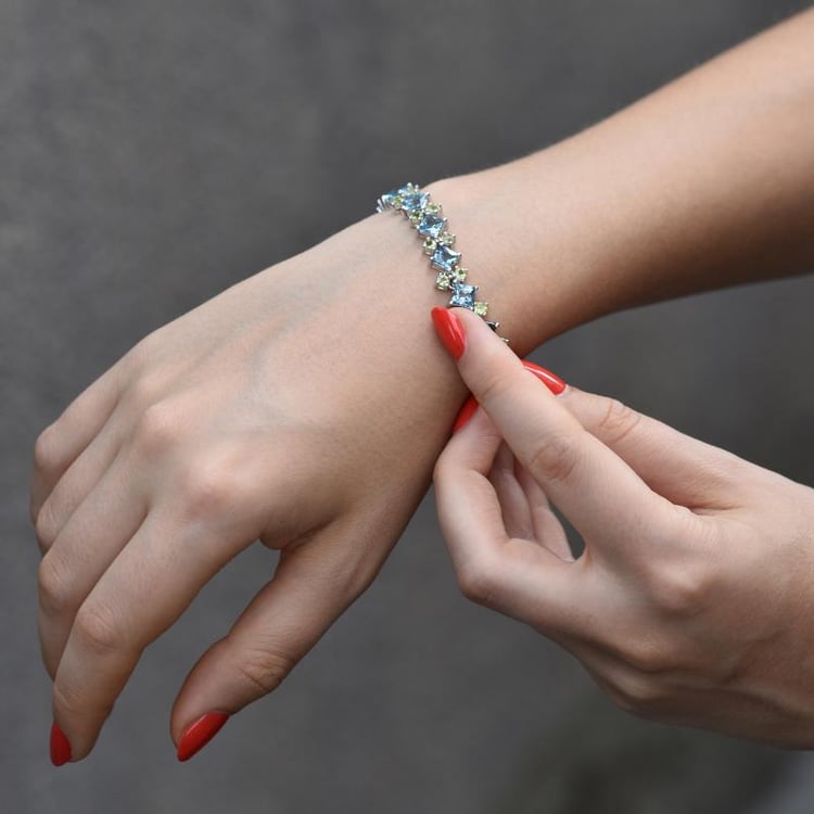 Fesselndes Silberarmband mit Topasen und Olivinen 17.5ct Kiele 44738