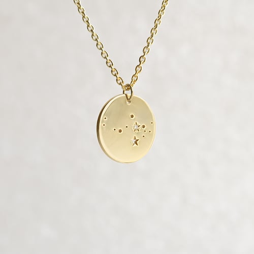 Goldener Anhänger mit Sternbild und Diamant Nyala