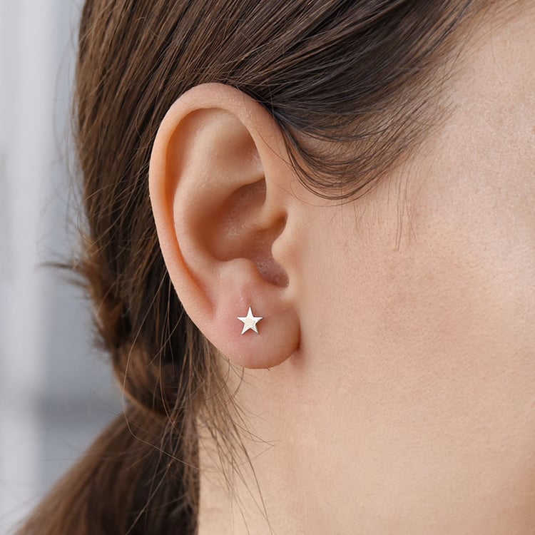 Goldene Ohrringe mit Schraubverschluss als Stern Maya 89191