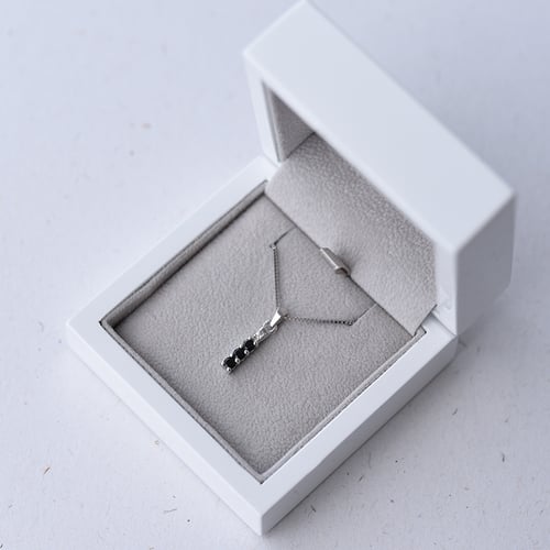 Zarte silberne Anhänger mit schwarzen Onyxen Freesia