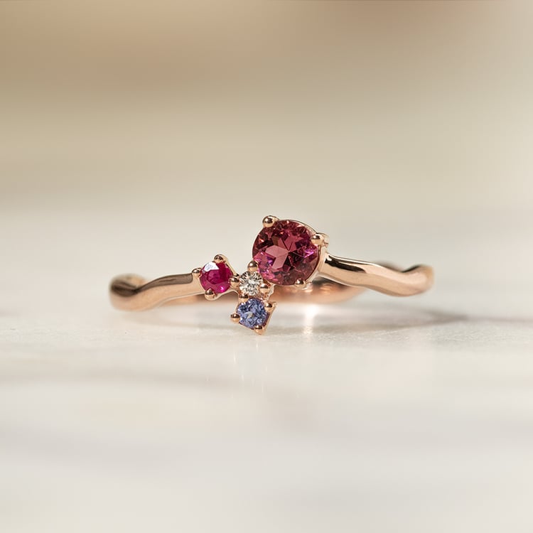 Cluster-Ring mit Turmalin, Tansanit, Rubin und einem Diamanten Roche 138424