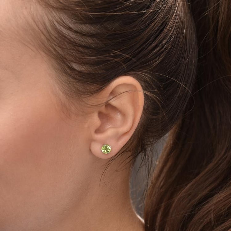 Goldene Ohrringe mit runden Olivinen Hulda 34781