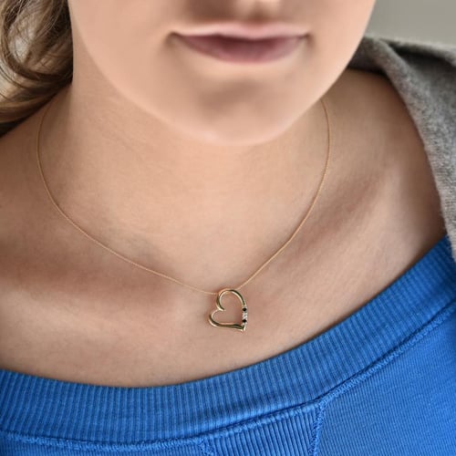 Silberner Anhänger mit einem Herzen und schwarzen und weißen Diamanten Tanish