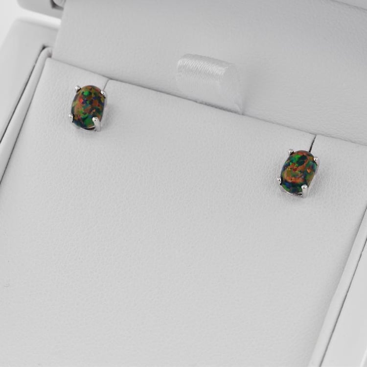 Schwarzer Opal in goldenen Ohrringen Qati 25855