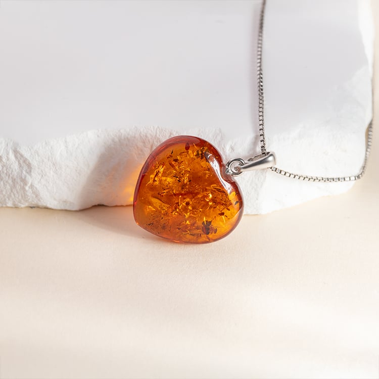 Silbernes Set mit Bernstein in Herzform Artu 150514