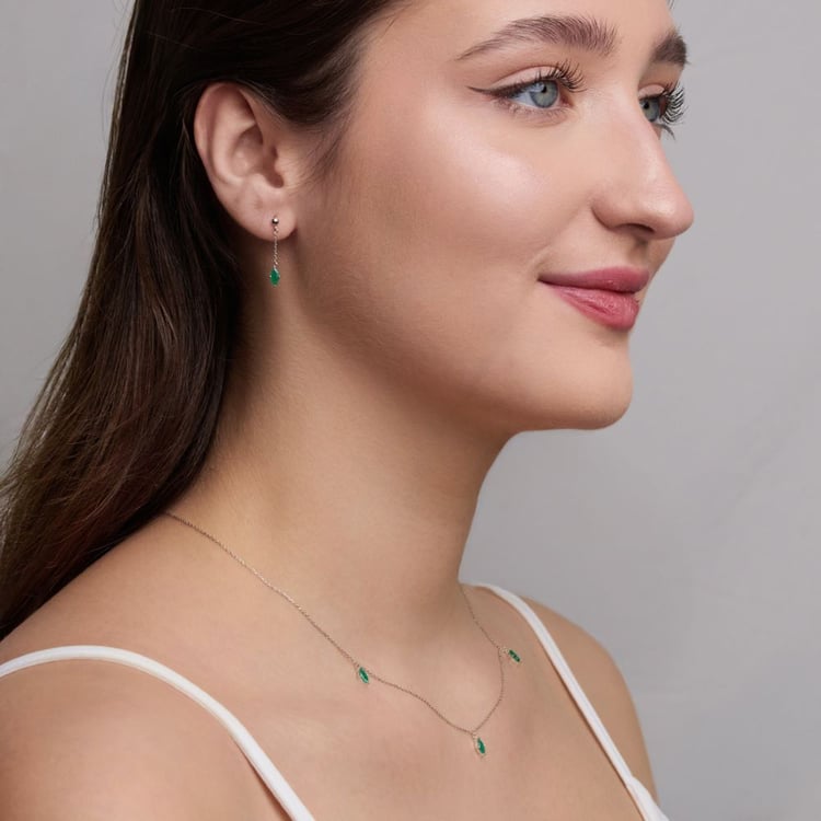 Goldene Hängeohrringe mit brasilianischen Smaragden 164065