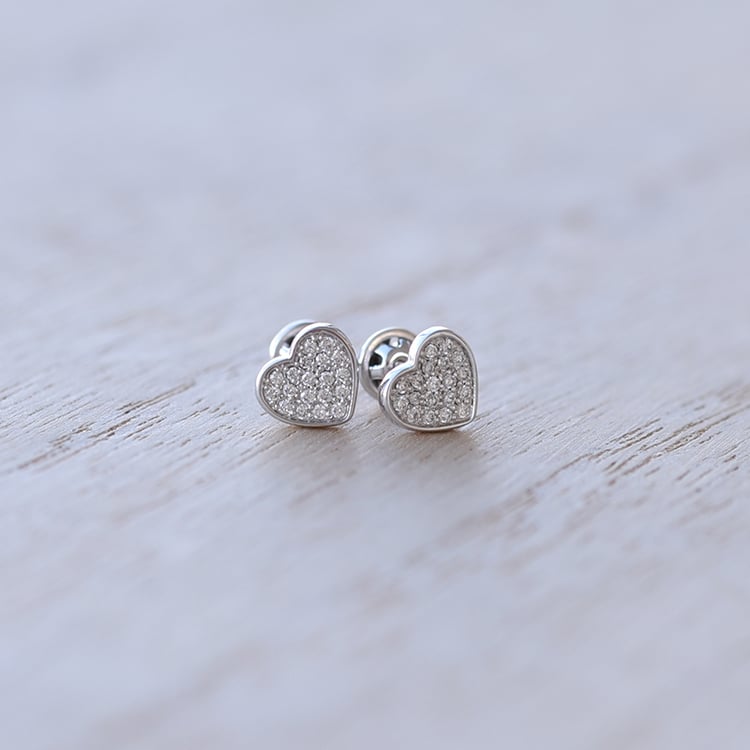 Goldene Ohrringe mit Diamanten im Herzform 62074