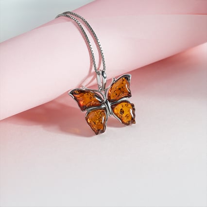 Silberner Anhänger mit Bernstein in Form eines Schmetterlings Kupu