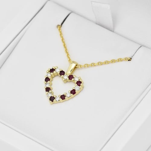 Goldenes Herz voller Rubine und Diamanten Devamati