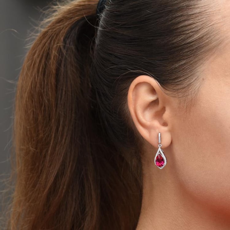 Silberne Ohrringe mit Rubinen 27618
