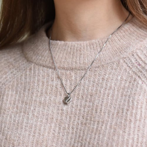 Silbernes Medaillon mit einem Diamanten Galya