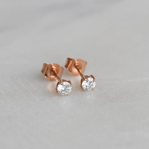 Ohrringe mit Diamanten und vier Krappen Christi
